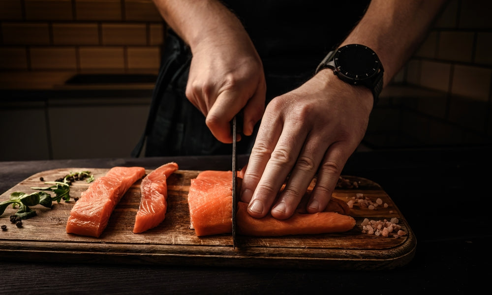 Cutting Salmon with Hot Blue Black Oxide DFACKTO Chef Knife